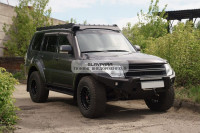 Бампер силовой передний STC тип Revo Mitsubishi Pajero 2006+ защитная дуга, птф, дальний свет