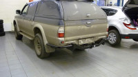 Задний силовой бампер АМЗ для Mitsubishi L200 1996-2005 (трубный)